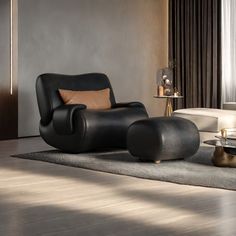 a living room with a couch, chair and coffee table on the floor in front of a window