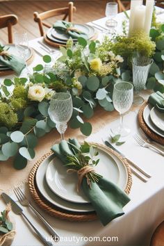 the table is set with plates, napkins and place settings for dinner guests to enjoy