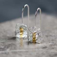 Handmade Sterling Silver & 24ct Gold Square Drop Earrings, Keum Boo, Reticulated Silver Drop Earrings, Square Earrings, Textured Silver Handmade with recycled, solid, sterling silver sheet that has been reticulated, to give it this unusual stone-like texture on the surface. Very fine pieces of 24ct gold foil are applied in the ancient Korean technique of Keum-Boo, where the 'attached gold' is fused to the surface of the silver with pressure and heat. The edges are polished to a shine. The drops Reticulated Silver, Keum Boo, Earrings Square, Writing Gifts, Square Earrings, Everyday Earrings, Silver Drop Earrings, Gorgeous Earrings, Handmade Sterling Silver