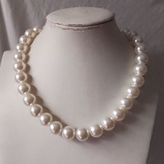 Welcome back to my shop: https://www.etsy.com/shop/pearlandjewelry Description of the product in the picture: This necklace with  14 mm  ivory color plastics pearl beads. The length of the necklace is 18 inches.You can choose the length when you order.and the necklace with a lobster clasp and it still has a 2 inch long adjustable chain. If you need the other lengh or size ,Please feel free contact me. Thank you so much, :) Cheap Vintage Pearl White Necklace, Big Beads Necklace, Rocky Horror Picture Show Costume, Fake Pearl Necklace, Gyaru Hair, Big Pearl Necklace, Pearl Necklace Choker, Necklace Big, Pearl Necklace Wedding