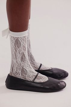 So lovely in a stunning lace fabrication, these head-turning socks are featured in a staple crew silhouette with defined bow at back for an added femme finishing touch. **Features:** Crew style, lace fabrication, bow-adorned back, semi-sheer style **Why We ❤ It:** Just as effortless as they are essential, these stand-out socks are ideal to pair with anything from a cool and casual look to a more formal ‘fit. | Lace Rear Bow Socks by Free People in White Free People Socks, White Lace Socks, Lacy Socks, Bow Socks, Sheer Socks, Lace Tights, Lace Socks, Winter Socks, New York Style