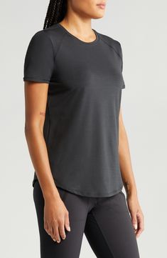 Go from workout to hangout in a raglan-sleeve T-shirt made from ultrasoft, stretchy tech fabric that wicks moisture and dries quickly. 25 1/2" length (size Medium) Crewneck Short sleeves Reflective details enhance visibility in low light or at night Moisture-wicking fabric engineered for dryness and comfort 88% polyester, 12% spandex Machine wash, tumble dry Imported This garment was made in a factory that supports women-worker empowerment through HERproject, which creates partnerships to enable Financial Inclusion, Gender Equality, Paisley Design, Low Light, Free Fabric, Women Supporting Women, Moisture Wicking Fabric, Active Wear For Women, Raglan Sleeve