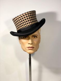 * Stunning medium low top hat from wool felt, stiffened and hand blocked over millinery wooden hat blocks. Houndstooth print. * ENTIRELY HANDSEWN. It is an artisan product, completely handmade, none of the pieces I make is absolutely identical to another. Made to order. I personally design and handcraft each headpiece with care and great attention to detail. I do not have all these hats in stock, they are made one by one, according to the size and color chosen by each one of my customers Element Luxury Elegant Wool Top Hat, Elegant Handmade Adjustable Top Hat, Classic Brimmed Top Hat, Affordable, Country Style Brimmed Top Hat, One Size, Edwardian Hat, Steampunk 4" Top Hat, Hat Blocks, Crown Heights, Blind Stitch