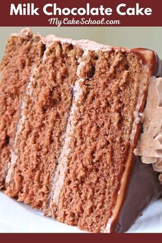 a close up of a slice of cake on a plate with chocolate frosting in the middle