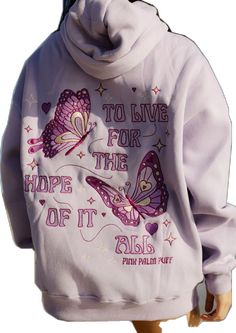 The "To Live For the Hope of it All" Oversized Hoodie is crafted from top-quality fabrics, while having an exquisite embroidery art of fine-detailed butterflies. The PPP palm embroidered above our hearts is a symbol of unity within the Pink Palm Puff community, reminding us all of the love we share. Pink Palm Puff Hoodie Purple, Hoodie Collection Aesthetic, Hoodie Wishlist, Preppy Sweatshirts, Inspiring Message, Cozy Fabric, Bright Side, Funny Graphics