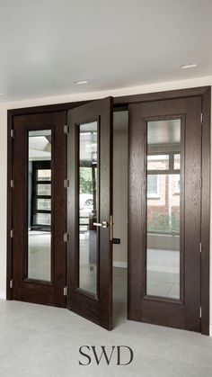 Add a touch of elegance to your home with these modern dark wood bi-fold doors featuring sleek glass panels. Perfect for creating a seamless connection between rooms or enhancing natural light, these doors offer both style and functionality. Ideal for open, modern interiors. ✨🏡

#swdbespoke
#bespokedoors
#luxurydoors
#highglossdoors
#oakdoors
#bespokeoakdoors
#luxuryoakdoors
#oakstaineddoors
#internaldoors
#interiordoors
#bespokedoorsuk
#bespokedoorsdubai
#uniquedoors
#luxurydoorsusa
#luxurydoorsdubai