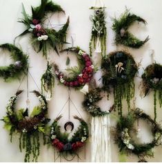 a group of wreaths hanging on the wall