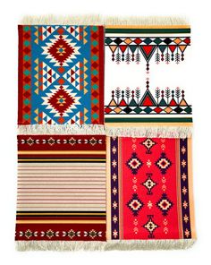 four different colored rugs with fringes and designs on the sides, all in different colors