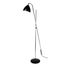 a floor lamp with a black shade on the top and one light on the bottom