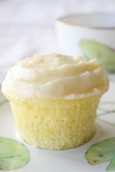 a cupcake sitting on top of a white plate