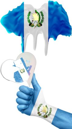 two hands with painted blue and white colors holding a heart shaped object in front of them