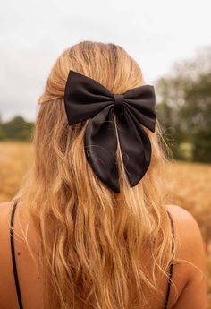 The Black Falla Bow is a stunning 6.3 inch hair clip, perfect for adding a touch of elegance and sophistication to any hairstyle. Colors: black - beige Elegant Black Ribbon Hair Accessories For Party, Chic Party Hair Accessories With Satin Bow, Elegant Black Hair Accessories With Bow, Chic Formal Hair Accessories With Satin Bow, Elegant Black Ribbon Hair Accessories, Elegant Black Hair Accessories With Decorative Bow, Chic Black Hair Accessories For Evening, Black Elegant Formal Hair Accessories, Elegant Black Formal Hair Accessories