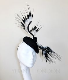 No more availability in June 2023. Earliest dispatch 4th July 2023. thanks  No more availability in June 2023. Earliest dispatch 4th July 2023. thanks READY TO SHIP FOR ROYAL ASCOT, latest date of purchase will be 9th June shipping by express delivery.  Inspired by film My Fair Lady, the iconic Black White theme designed by Cecil Beaton.  Ultimate feminine look with hottest monochrome trend this summer, in racing closure, wedding receptions or any special occasions.  It made in high quality natural fibre sinamay and super light feathers, ideal for spring and summer. Please allow at least 10 working days for special size. The special colours up to 4 weeks. Please email via info@yuanli.london for special request. *Please note, we try our best to describe and photography the product, but the Cecil Beaton, Swirl Hat, Large Brim Hat, Royal Ascot Hats, Novelty Hats, Types Of Hats, Melbourne Cup, Black And White Theme, Feather Fascinators