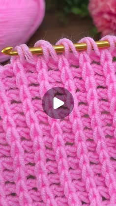 the video shows how to crochet stitches in this knitted stitching project