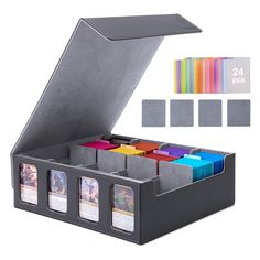 an open box with several different colored cards in it