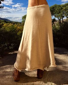 Long knit skirt made out of 100% natural alpaca or organic merino wool. This skirt is wonderful in the cool weather and looks amazing with boots. The skirt provides the perfect warmth. It blocks the wind, and with a pair of alpaca tights or leggings worn beneath, you will stay toasty warm. It is like wrapping a blanket around you, yet you can walk and move with comfort and ease, and you don't have to hold it up with your hands ; ) The A line quality of the skirt allows full range of motion. The Long Knit Skirt, Wool Tights, Shopping Link, Natural Clothing, Five Panel, Paneled Skirt, Long Knit, Flowy Skirt, A Blanket