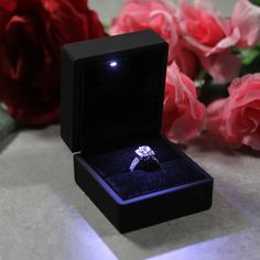 black ring box with led lighting, proposal ring box with light, engagement ring box with roses, luxury engagement ring box, ring box for night proposal Wedding Rings In Box Beautiful, Light Up Ring Box, Engagement Rings In Boxes, Ring For Proposal, Proposal Ring Box Ideas, Wedding Ring In Box, Engagement Ring Box Ideas, Engagement Rings Box, Ring Box Design