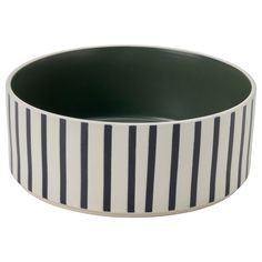 a black and white striped bowl on a white background