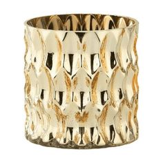 a gold and white candle holder on a white background