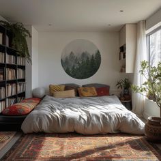 a bedroom with a large bed and lots of books on the shelves next to it