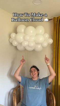 a woman sitting in a chair with balloons on her head and the words how to make a balloon cloud above her head