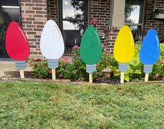 colorful lawn decorations in front of a brick building