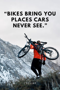 a man carrying a bike up the side of a mountain with a quote above it