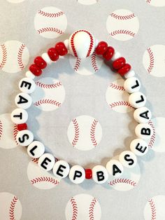 a beaded bracelet that says eat sleep baseball