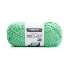 yarn ball in green on white background