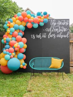 a bunch of balloons that are on top of a blackboard with the words, the greatest adventure is unfatt des ahead