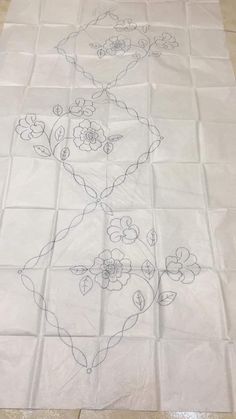 a piece of cloth with flowers drawn on it