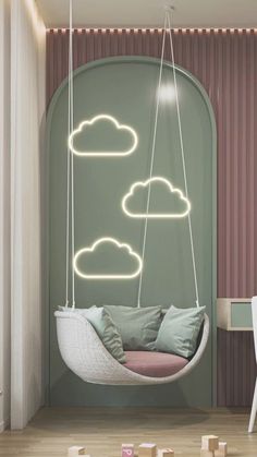 a room with a swing chair and clouds on the wall