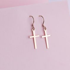 Cross earring, Dainty Cross earring, Personalized Earring, Custom Cross, Religious Earring, Earring Gift, Religious Jewelry Gift For Mother ►HOW TO ORDER - Please select your preferred color. ►PRODUCT DETAILS Cross Lenght is 22 mm. Cross Width is 12 mm. The material is Solid Sterling Silver. This beautiful earring comes with a special gift box. Please make a note if you would like to leave a gift message along with your order. ►SATISFACTION GUARANTEED!! - I gladly accept returns and exchanges. - Single Cross Earring As Gift, Minimalist Cross Earrings For Gift, Elegant Cross Earrings For Everyday, Elegant Everyday Cross Earrings, Everyday Elegant Cross Earrings, Nickel-free Cross Earrings As Gift, Nickel-free Cross Earrings For Gift, Minimalist Hypoallergenic Cross Earrings, Christian Earrings