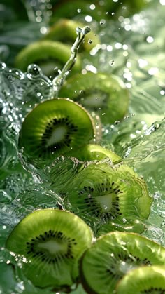 several kiwis floating in the water on top of each other