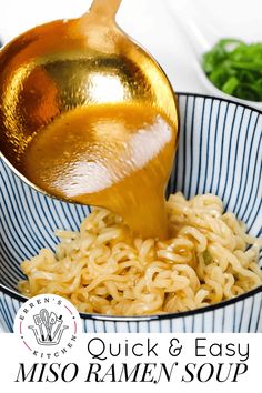 a bowl filled with noodles and sauce being poured into it