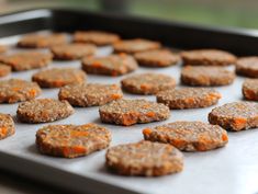 raw carrot cookies on a baking sheet ready to be baked