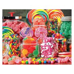 a large assortment of candies and lollipops on display