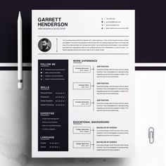 a black and white resume template with a pencil next to it on top of a table