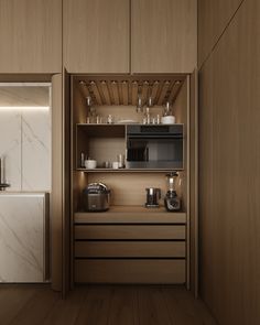 a kitchen with wooden cabinets and white appliances