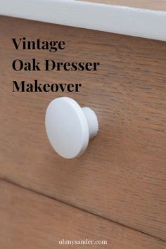 an oak dresser with white knobs and the words vintage oak dresser makeover on it