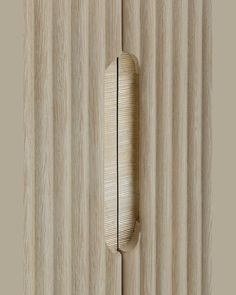 a wooden door with a handle on it