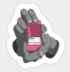 a hand holding an electronic device with the word esc on it