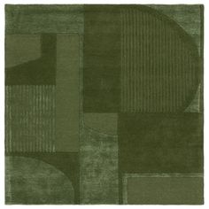 an area rug with various shapes and colors on it, including green tones in the center