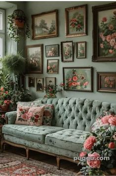 a living room filled with lots of flowers and pictures on the wall above it's couch