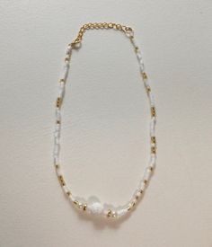 Handmade white and gold beaded necklace with white accent bead. White And Gold Beaded Necklace, Gold Beaded Necklace, Gold Bead Necklace, White Accents, Beaded Necklaces, Gold Gold, Gold Beads, Beaded Necklace, Jewelry Necklaces