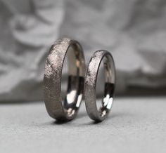 Comfort fit Titanium wedding rings set, cross matt finish, pictures on hand and video 3.00 mm and 6.00 mm. PLEASE LET US KNOW IN "PERSONALISATION" SECTION YOUR PREFFERED RING WIDTH. WIDTH VARIATIONS: from 2.00 mm to 10.00 mm Pictured 6.00 mm and 3.00 mm  Video 6.00 mm and 3.00 mm  Cross matt finish outside and polished inside.  WHAT IS TITANIUM?  Titanium is element number 22 on the periodic table. It is a metal that found naturally on Earth. Titanium is light grey colour metal that is hypoaller Matching Wedding Ring Sets, Wedding Rings Set, Ring Exchange, Number 22, Alternative Wedding Rings, Matching Wedding Rings, The Periodic Table, Titanium Wedding Rings, Rings Set