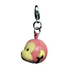 a key chain with a pink and yellow animal on it