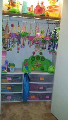 the closet is full of toys and other items for children to put in their playroom