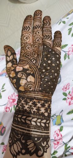 a henna on someone's hand is shown