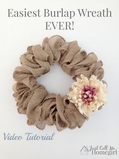 an easy burlap wreath with flowers on it